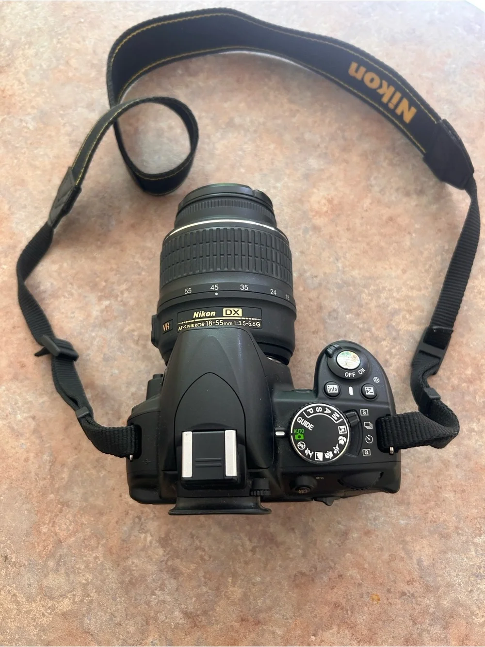 Nikon Black 3100 DSLR Camera with Zoom Lens and Branded Strap